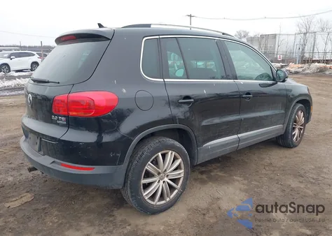 2014 Volkswagen Tiguan Sel z USA, uszkodzony, nr VIN WVGBV3AX2EW525813